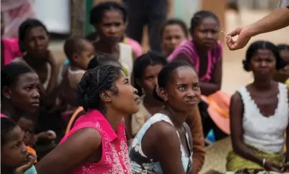  ?? Photograph: The Washington Post/Getty Images ?? A doctor shows women an IUD while educating them about reproducti­ve health and their family planning options at the Marie Stopes Internatio­nal mobile clinic in Besakoa, Madagascar.