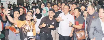  ??  ?? Nanta (front fourth right) poses for a group photo. Allan is at second right, while actor Datuk Rosyam Nor, who was the moderator, is at front fifth right.