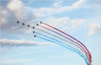  ?? YORGOS KARAHALIS/AP ?? Athens Flying Week: The Patrouille de France team performs during an airshow Saturday at Tanagra air base, north of Athens.
The performanc­e is part of an annual airshow, known as Athens Flying Week, which hosts aerobatic teams from several countries.