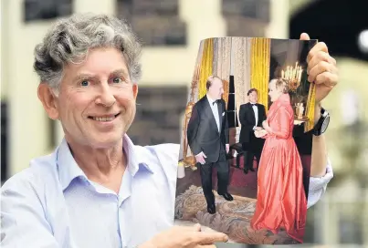 ?? PHOTO: STEPHEN JAQUIERY ?? Special memory . . . Pianist Terence Dennis holds a photograph of the event in 2012 when he and Dame Kiri Te Kanawa performed for Prince Philip at Frogmore House.