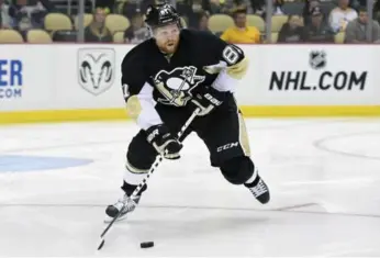  ?? JEANINE LEECH/THE ASSOCIATED PRESS ?? Penguins winger Phil Kessel should benefit from the extra space during three-on-three overtime periods.