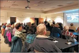  ?? SUBMITTED ?? Members of the Euclid Police Department present the CRASE (Civilian Response to Active Shooter Event) program to an audience at the Euclid Public Library in April.