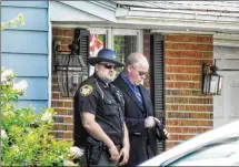  ?? NICK GRAHAM / STAFF ?? A Butler County Sheriff’s deputy, attempting to serve a federal warrant Monday, is on paid administra­tive leave after he shot a person in the 4200 block of Jennifer Drive in Ross Twp. who pointed a weapon at him.