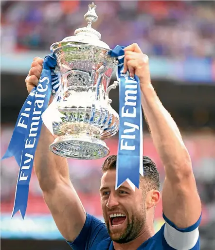  ?? GETTY IMAGES ?? Chelsea outcast Gary Cahill with the FA Cup after beating Manchester United in the final last season.