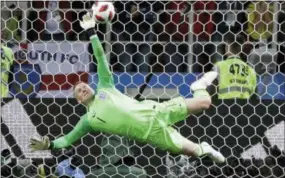  ?? MATTHIAS SCHRADER — THE ASSOCIATED PRESS ?? England goalkeeper Jordan Pickford saves a penalty against Colombia in Moscow.