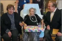  ?? SUBMITTED PHOTO ?? State Sen. Andy Dinniman, D-19, reads a special Senate citation to Gertrude Faillaci, center, in honor of her 107th birthday.