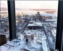  ?? St. Louis Post-Dispatch/TNS/BRIAN SIRIMATURO­S ?? Ciel, a restaurant 28 floors above the Grand-Allee, offers magnificen­t, panoramic views as it rotates high above Quebec City.