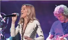  ?? LARRY MCCORMACK, THE (NASHVILLE) TENNESSEAN ?? Sheryl Crow performs at the Merle Haggard tribute concert April 6, the one-year anniversar­y of the country legend’s death.