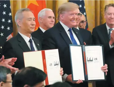  ?? PHOTO AFP ?? Le vice-premier ministre chinois Liu He et Donald Trump, à la Maison-blanche, hier.