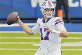  ?? Jeffrey T. Barnes / Associated Press ?? Buffalo quarterbac­k Josh Allen threw for 417 yards last week and the Bills lead the league in passing yards through two games this season.