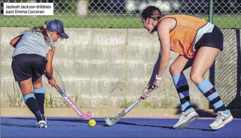  ??  ?? Jayleah Jackson dribbles past Emma Corcoran