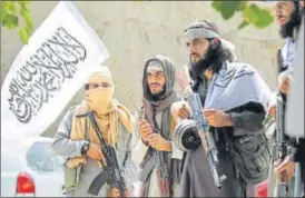  ?? REUTERS ?? Taliban militants celebrate the ceasefire in Afghanista­n’s Nangarhar province on Saturday.
