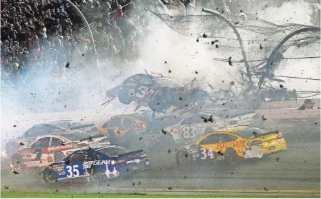  ?? REINHOLD MATAY, USA TODAY SPORTS ?? Austin Dillon’s No. 3 Chevrolet crashes against the catchfence Monday during the finish of the Coke Zero 400.