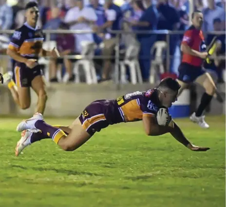  ?? Photo: David Martinelli ?? TRY TIME: Corey Paix scores for the Broncos in their Warwick trial match against Souths Logan.