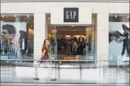  ?? Gene J. Puskar / Associated Press ?? A Gap store in Pittsburgh. Gap’s same-store sales rose 3 percent in the latest quarter.