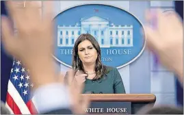  ?? [THE ASSOCIATED PRESS PHOTOS] ?? White House press secretary Sarah Huckabee Sanders fields questions from the news media Friday at the White House. Many of the questions dealt with the controvers­y over honoring fallen soldiers that has involved President Donald Trump, chief of staff...