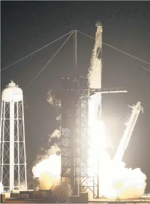  ?? PHOTO: REUTERS ?? Space partnershi­p . . . A SpaceX Falcon 9 rocket, topped with the Crew Dragon capsule, is launched with four astronauts on board from Nasa’s Kennedy Space Centre in Cape Canaveral, Florida, yesterday.