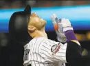  ?? Patrick Semansky / Associated Press ?? Colorado’s Trevor Story is grateful after his solo home run in the seventh inning.