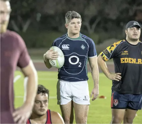  ?? Antonie Robertson / The National ?? Sean Carey, centre, is founder and coach of the the UAE’s newest rugby team, Dubai Sports City Eagles