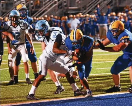  ?? MICHAEL REEVES — FOR DIGITAL FIRST MEDIA ?? D’East’s Garvey Jonassaint scores in the fourth quarter against North Penn Friday night.