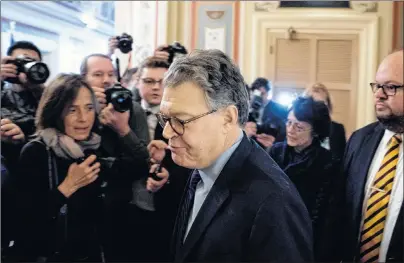  ?? AP PHOTO ?? Sen. Al Franken, D-Minn., arrives on Capitol Hill in Washington Thursday. Franken said he will resign from the Senate in coming weeks.