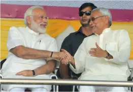  ?? — PTI ?? Prime Minister Narendra Modi and Bihar chief minister Nitish Kumar at an event in Patna district’s Mokama on Saturday.