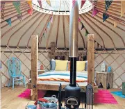  ??  ?? Stay cosy in Powys in one of the Secret Yurts, above