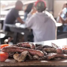  ??  ?? GOOD TIMES: Cooked meat and easy vibes are at the heart of the city’s Shisanyama restaurant­s. Catch the festival at the Eyadini Lounge in Umlazi today.