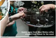  ??  ?? Guests enjoy fresh Maui Mokka coffee shipped from Hawaii for the event