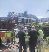  ??  ?? A fire tore through the home, in Newchurch Road, Tovil, leaving a hole in the roof
