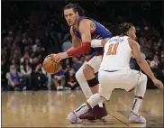  ?? MARY ALTAFFER — THE ASSOCIATED PRESS ?? Nuggets forward Aaron Gordon drives against Knicks guard Jalen Brunson during the first half of Saturday’s game at Madison Square Garden in New York.