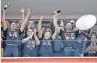  ?? | EPA ?? LEVERKUSEN’S coach Xabi Alonso lifts a mock Bundesliga Meistersch­ale trophy after officially winning the title on Sunday.