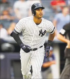  ?? Kathy Willens / Associated Press ?? The delayed start of the MLB season due to the coronaviru­s pandemic has given Yankees CF Aaron Hicks extra time to recover from elbow surgery.