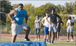  ??  ?? Yuba College football players go through an agility drill during Wednesday’s noncontact conditioni­ng day.