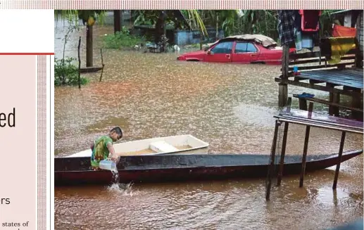  ?? PIX BY FATHIL ASRI ?? Kampung Tersang in Rantau Panjang inundated by floodwater­s yesterday.