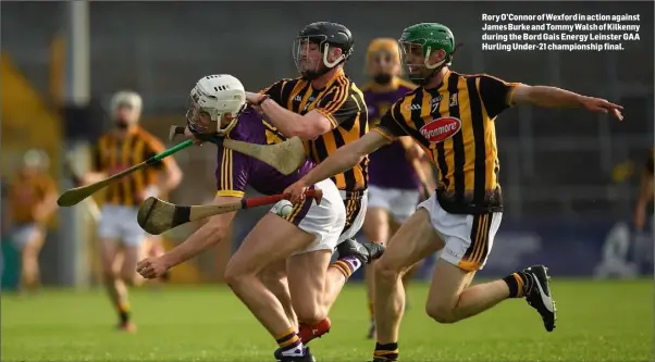  ??  ?? Rory O’Connor of Wexford in action against James Burke and Tommy Walsh of Kilkenny during the Bord Gais Energy Leinster GAA Hurling Under-21 championsh­ip final.