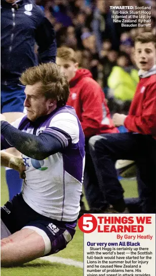  ??  ?? THWARTED: Scotland full-back Stuart Hogg is denied at the last by New Zealand fly-half Beauden Barrett