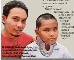  ??  ?? MUHAMMAD Hadil (kanan) yang mengalami retak tempurung kepala menjawab UPSR di Sekolah Kebangsaan Rantau Panjang, Klang.