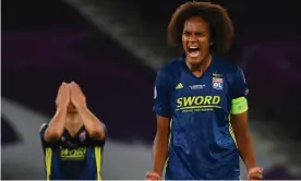  ??  ?? Lyon captain Wendie Renard shows her delight at the final whistle. Photograph: Gabriel Bouys/EPA