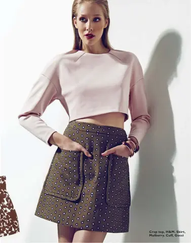  ??  ?? Crop top, H& M. Skirt, Mulberry. Cuff, Gucci