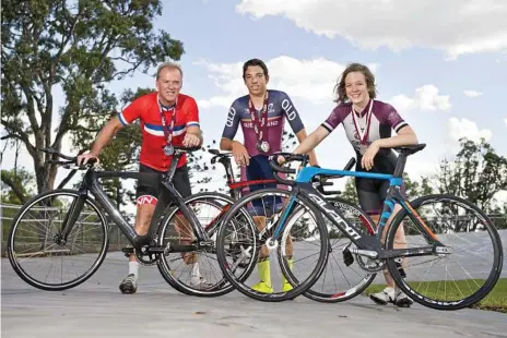  ?? Photo: Kevin Farmer ?? NATIONALS BOUND: Toowoomba riders to recently win state championsh­ip track medals include (from left) Robert Partington, Declan Trezise and Emma Stevens. The trio will compete at upcoming national title events.