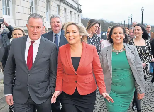  ??  ?? Northern Ireland’s new Deputy First Minister Michelle O’Neill, centre, arrives at Stormont with Conor Murphy and Mary Lou McDonald