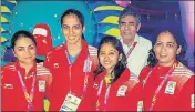  ?? PTI ?? Saina Nehwal (2nd from left) with her father and shooters Apoorvi Chandela, Mehuli Ghosh and Tejaswini Sawant at Games Village.