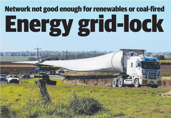  ?? RENEWABLE PUSH: The first truck transporti­ng wind turbine components to Walkamin on the Atherton- Malanda Rd on Tuesday morning. Picture: NATASHA EMECK ??