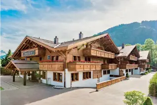  ?? ?? Ultima Gstaad has three wooden chalets, six private residences, a restaurant and two bars.