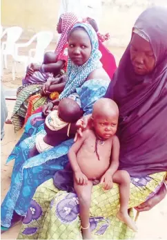  ??  ?? Mothers waiting for health officials at the MCH to attend to their malnurishe­d children