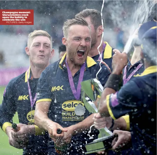  ?? PICTURES: Getty Images ?? Champagne moment: Warwickshi­re crack open the bubbly to celebrate the win