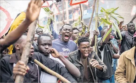  ?? Luis Tato AFP/Getty Images ?? OPPOSITION SUPPORTERS protest in Nairobi’s Mathare district. Police shot dead at least two protesters there, witnesses said.