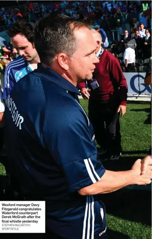  ?? STEPHEN McCARTHY/ SPORTSFILE ?? Wexford manager Davy Fitzgerald congratula­tes Waterford counterpar­t Derek McGrath after the final whistle yesterday