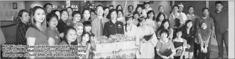  ??  ?? KPJ Kuching Specialist Hospital staff together with Chin Daw Methodist Church members posing for a group picture after the event yesterday.